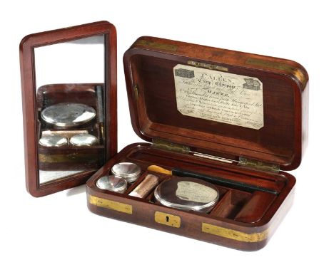 λ A VICTORIAN MAHOGANY CAMPAIGN DRESSING CASEBY J.W.ALLEN, C.1875the hinged lid with a vacant brass plaque, the underside wit