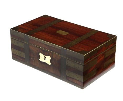 λ A REGENCY MAHOGANY AND BRASS BOUND BOXPROBABLY CAMPAIGN, EARLY 19TH CENTURYthe front with an ivory escutcheon, with a leath