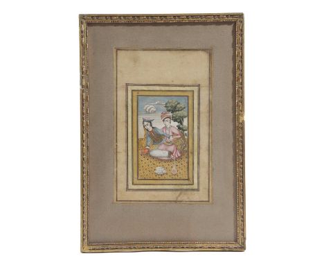 A PAIR OF PERSIAN MINIATURESQAJAR, 19TH CENTURYgouache on paper, each depicting a couple seated on a terrace, a cup and sauce