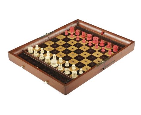A MAHOGANY AND BONE TRAVELLING CHESS SETBY JAQUES, LATE 19TH / EARLY 20TH CENTURYthe folding box revealing an ebony and boxwo