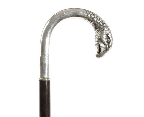 A CONTINENTAL SILVER MOUNTED WALKING CANEHALLMARKED 800 STANDARD, EARLY 20TH CENTURYthe handle with a finial in the form of a