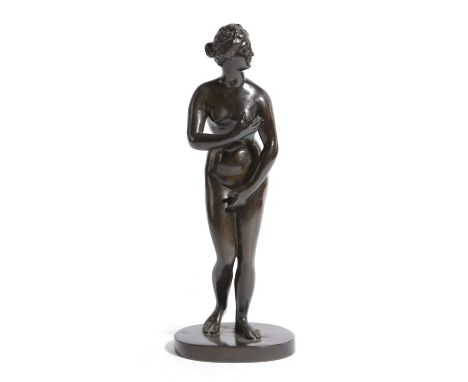 A FRENCH BRONZE GRAND TOUR FIGURE OF THE VENUS DE MEDICIAFTER THE ANTIQUE, LATE 19TH CENTURYon an oval base33cm highCatalogue