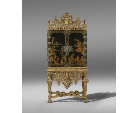 A FINE AND RARE WILLIAM AND MARY BLACK JAPANNED CABINET ON GILTWOOD STANDIN THE MANNER OF THOMAS PELLETIER, C.1690-1700the or