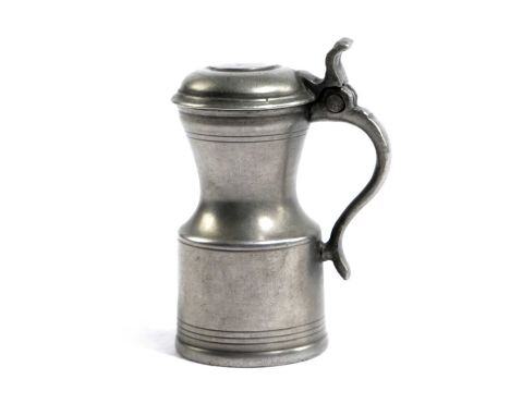 A SCARCE PEWTER QUARTER-GILL TAPPIT HENSCOTTISHwith low dome-lid having a plain central raised medallion and an erect solid b