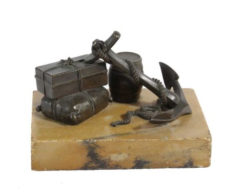 A FRENCH BRONZE AND SIENA MARBLE DESK PAPERWEIGHTC.1830-50modelled with an anchor and other nautical accoutrements9.3cm high,