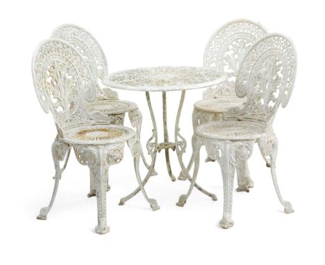 A SET OF FOUR FRENCH CAST IRON GARDEN CHAIRS20TH CENTURYeach with a foliate back above a circular 'rose window' style seat an