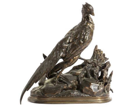 A FRENCH ANIMALIER BRONZE MODEL OF A PHEASANTBY JULES MOIGNIEZ (FRENCH 1835-1894)on a rocky oval base, signed34cm high, 32.5c