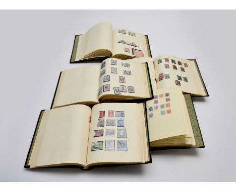 A collection of twenty-three stamp albums, containing Great Britain, British Commonwealth, South American and U.S.A. mint and