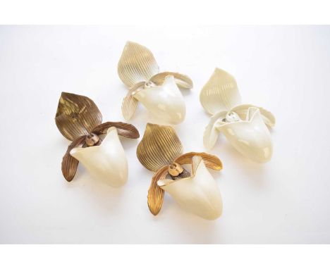 Four similar Royal Worcester wall pockets modelled as orchids, three with gilt and one plain white, late 19th century, 21cm h