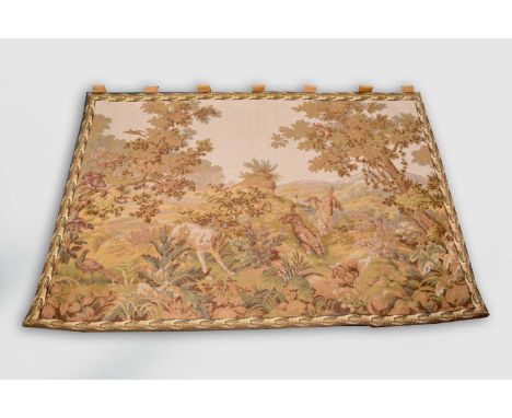 A French tapestry wall hanging of a hunting scene, 20th century, of horizontal aspect, worked with a scene of dogs chasing do
