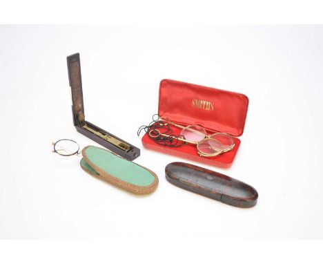 A pair of yellow metal lorgnettes, together with a pair of gold plated lorgnettes, a plated monocle, a pair of tortoiseshell 