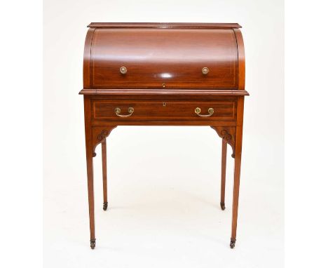 An Edwardian inlaid mahogany cylinder bureau, with a fitted interior, retractable writing surface and tapering square legs te