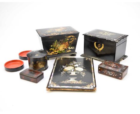 A collection of English lacquerware, late Victorian, painted with flowers with mother-of-pearl inlay and gilt detail, includi