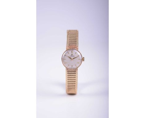 Omega: A lady's 9ct gold bracelet wristwatchDate: Circa 1961Movement: 17-jewel, Cal.483 manual windDial: Matt champagne with 