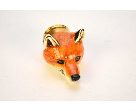 A Halcyon Days enamel bonbonniere, in the form of a fox mask head stirrup cup, inspired by a Derby porcelain original circa 1