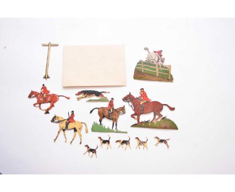 A collection of ivorine printed and painted, two-dimensional 'Cecil Aldin' figures, by repute used by Cecil Aldin as props fo