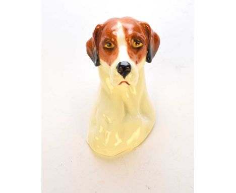 A Royal Worcester wall plaque in the form of a foxhound, modelled by Doris Lindner, circa 1933-57, numbered 3025, printed fac