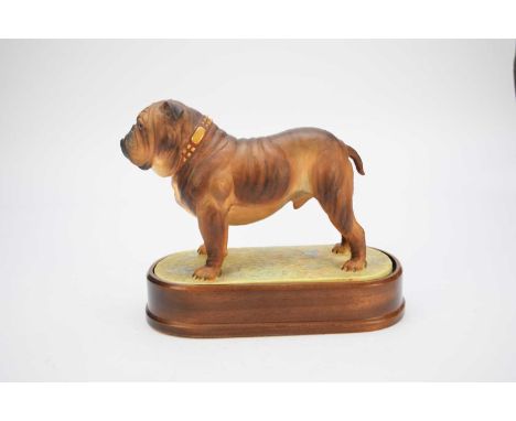 A Royal Worcester figure 'The Bulldog' by Doris Lindner, copyrighted 1968, with wooden plinth, printed factory marks, overall
