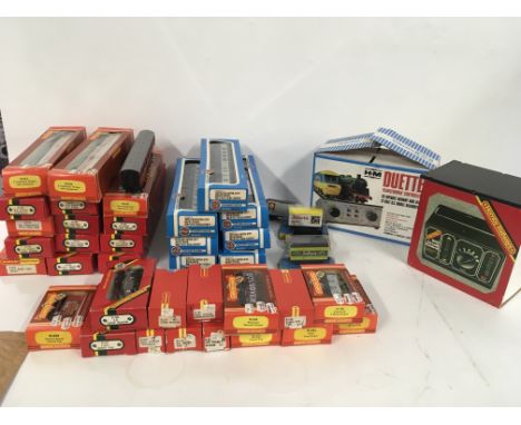 A collection of 22 model railway coaches by Hornby and Airfix plus 18 wagons and two transformers