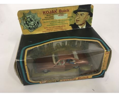 A Corgi model KOJAK Buick with figures. Repro box.