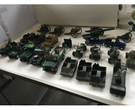 A collection of 24 Playworn diecast model military vehicles by Britains and others. NO RESERVE