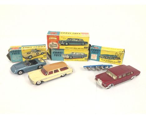 A Boxed Corgi Lotus Elan #318. A Mercedes Benz 600 Pullman #247. A Four Furrow Plough #61 and a Plymouth Sports Suburban Stat