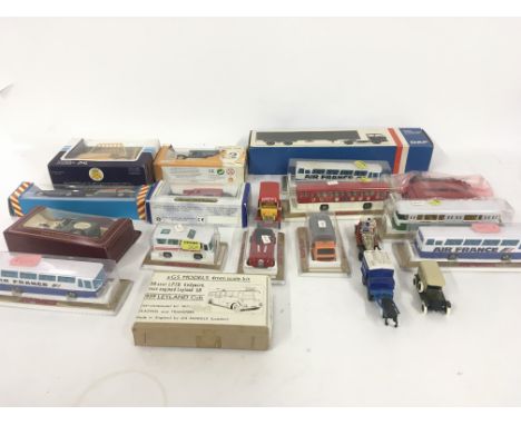 A collection of mainly boxed diecast and plastic model vehicles by various manufacturers