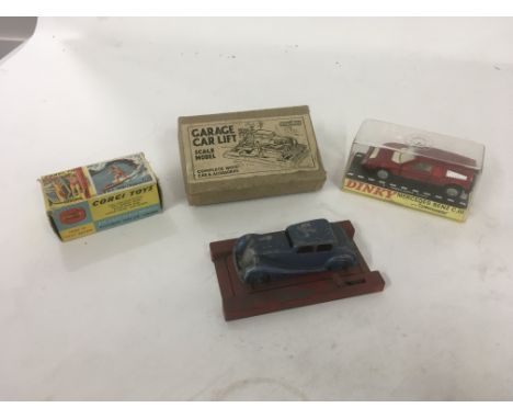 Original boxed Corgi diecast model 485MINI COUNTRYMAN with surfboard missing figure. Crescent Toys Garage car lift in origina