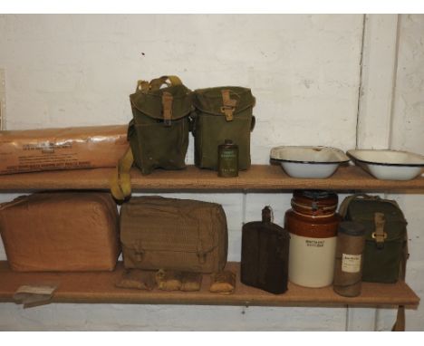 A W & G light II canvas gas mask, shoulder bag and gas mask along with two further canvas gas masks bags, a brown salt glazed