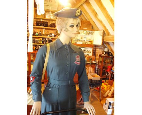 A WVS Civil Defence uniform, beret and mannequin