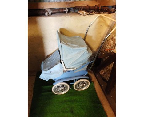 A child's four wheel pram, blue enamel with chromium handles and weather cover
