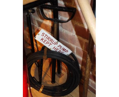 A collection of various stirrup pumps and hand tools