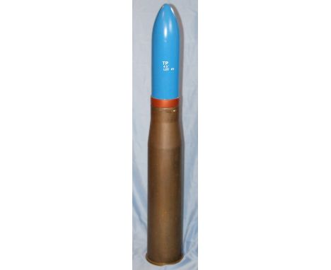 A 4.5inch Naval round for a British QF gun, the brass cartridge case manufactured by Royal Laboratories Birtley, with replica