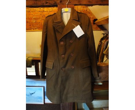 A Women's Land Army greatcoat, circa 1943 along with a brown leather jerkin (2)