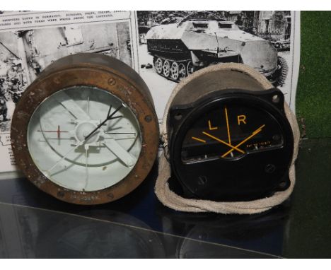 An aircraft cockpit instrument L+R, 3.25 inches diameter stamped A.M AN H54 ref No:110 Q/9, along with a 4 inch diameter bras