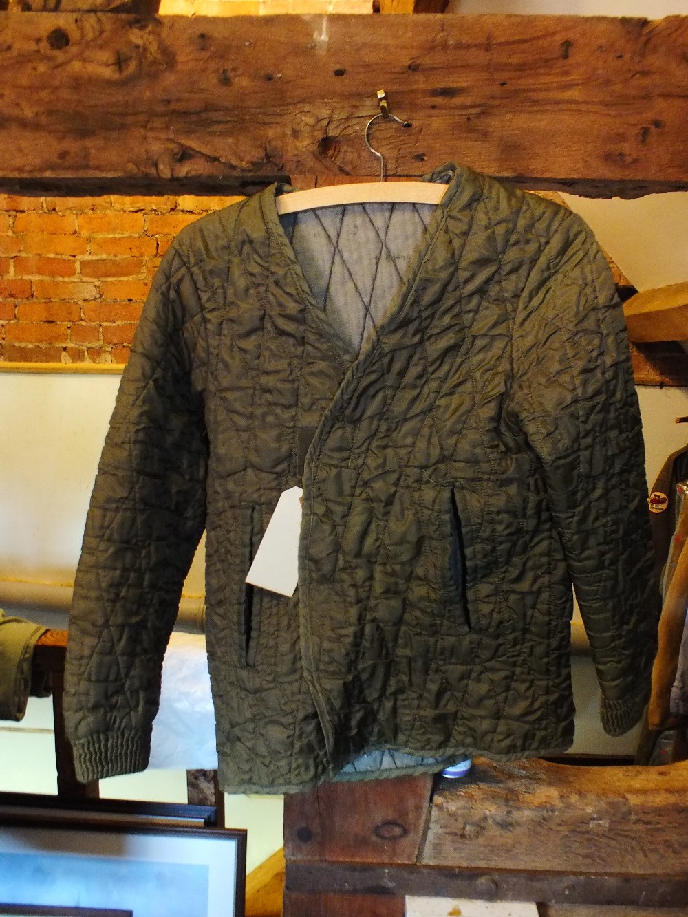 A sheepskin jerkin along with a quilted waistcoat