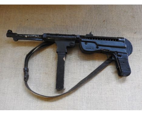 A replica light machine gun
This lot can only be sold for:
the purposes of a museum or gallery
the purposes or theatrical per