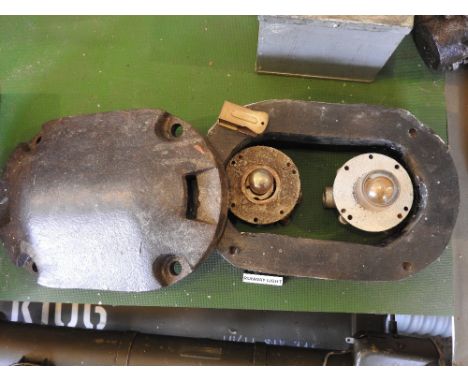 A wood cased cast iron topped two bulb runway light