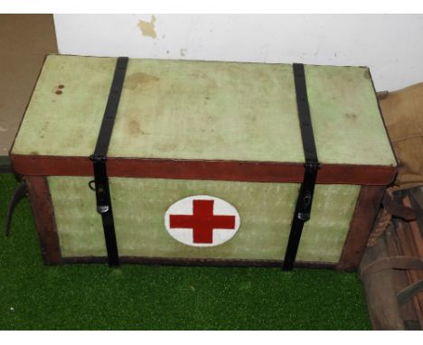 A WWII British Army Medics' woven cane hessian and leather bound field dressing box emblazoned with a red cross, containing a