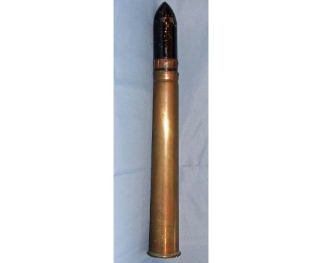 A British 2 Pr. Round for an anti-tank gun, brass cartridge case without primer, with fired, black painted steel projectile, 