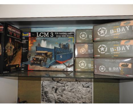 A collection of six boxed Corgi D-Day 60th anniversary vehicles along with a Revell LCM landing craft and jeep with trailer w
