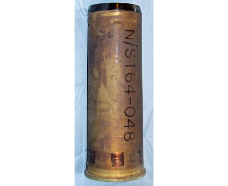 Two 105mm cartridge cases for the "charge super", where the bagged charge protrudes beyond the end of the cartridge case, thi