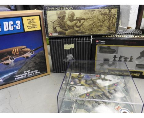 A boxed ERTL Douglas DC-3 along with a boxed Matchbox Collectables diecast Lockheed P38J Lightning, a boxed Century Wings 'Wi