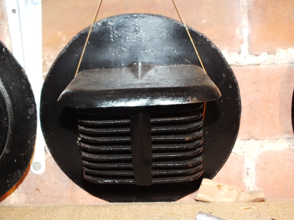 Three matched WW2 headlight covers with grill fronts