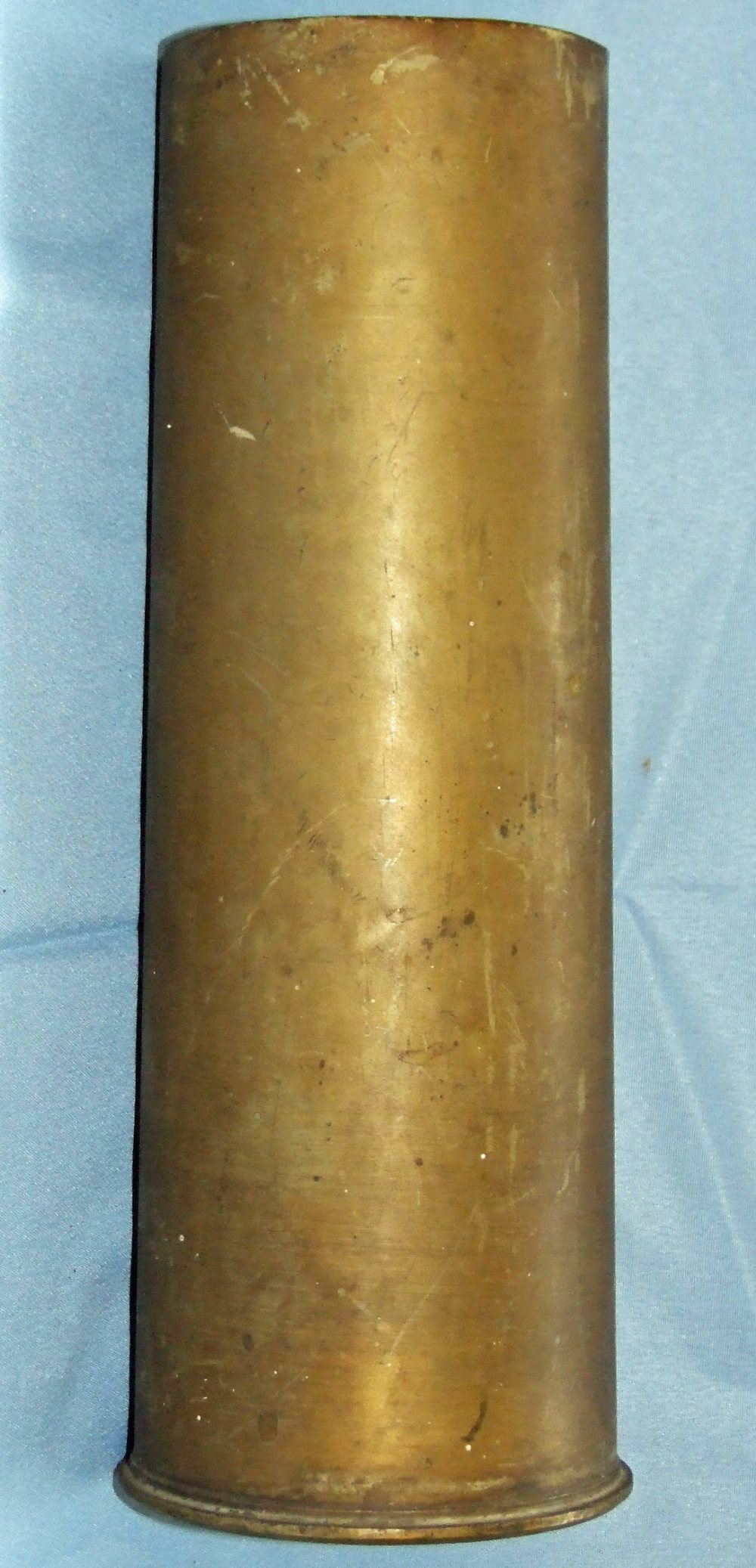 A collection of cartridge cases to include a 3in. cartridge case, with