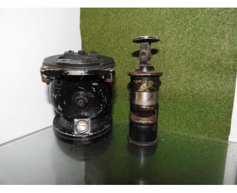 A World War Two A.C.U.S Army black vertical compass type B16 serial no:AF-43-12055 along with a Mk. 2 cockpit lamp ref No:5C/