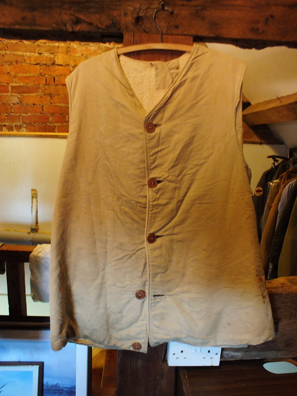 A sheepskin jerkin along with a quilted waistcoat
