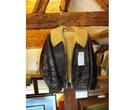 A sheepskin US Air Force leather flying jacket, later size label 36/R stitched to interior