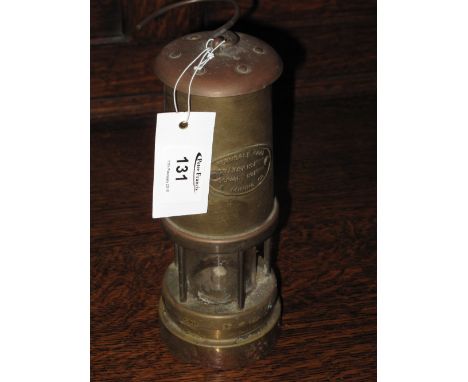 Brass Miners safety lamp, Ferndale coal and mining company.  CONDITION REPORT: Appears complete, wear as expected, some wax s