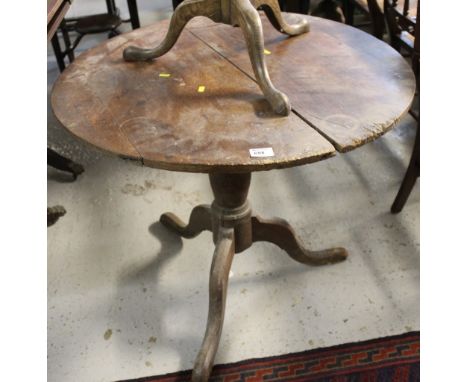 Oak circular tripod table. 